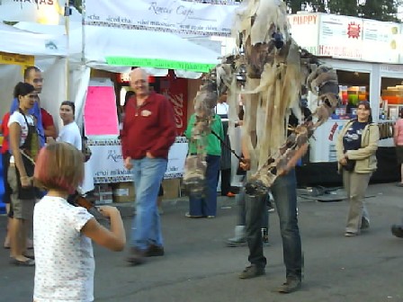 Alberta 043 A Scary Monster Playing A Violin Lures An Innocent Bystander Into Its Lair.jpg